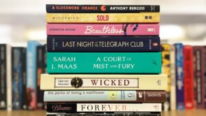 A stack of books on a table.