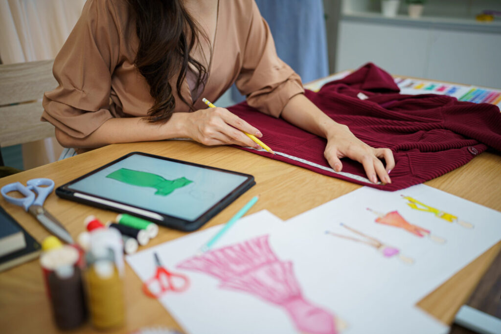 Start-up Stylish Fashion Designer work as sketch of new collecti