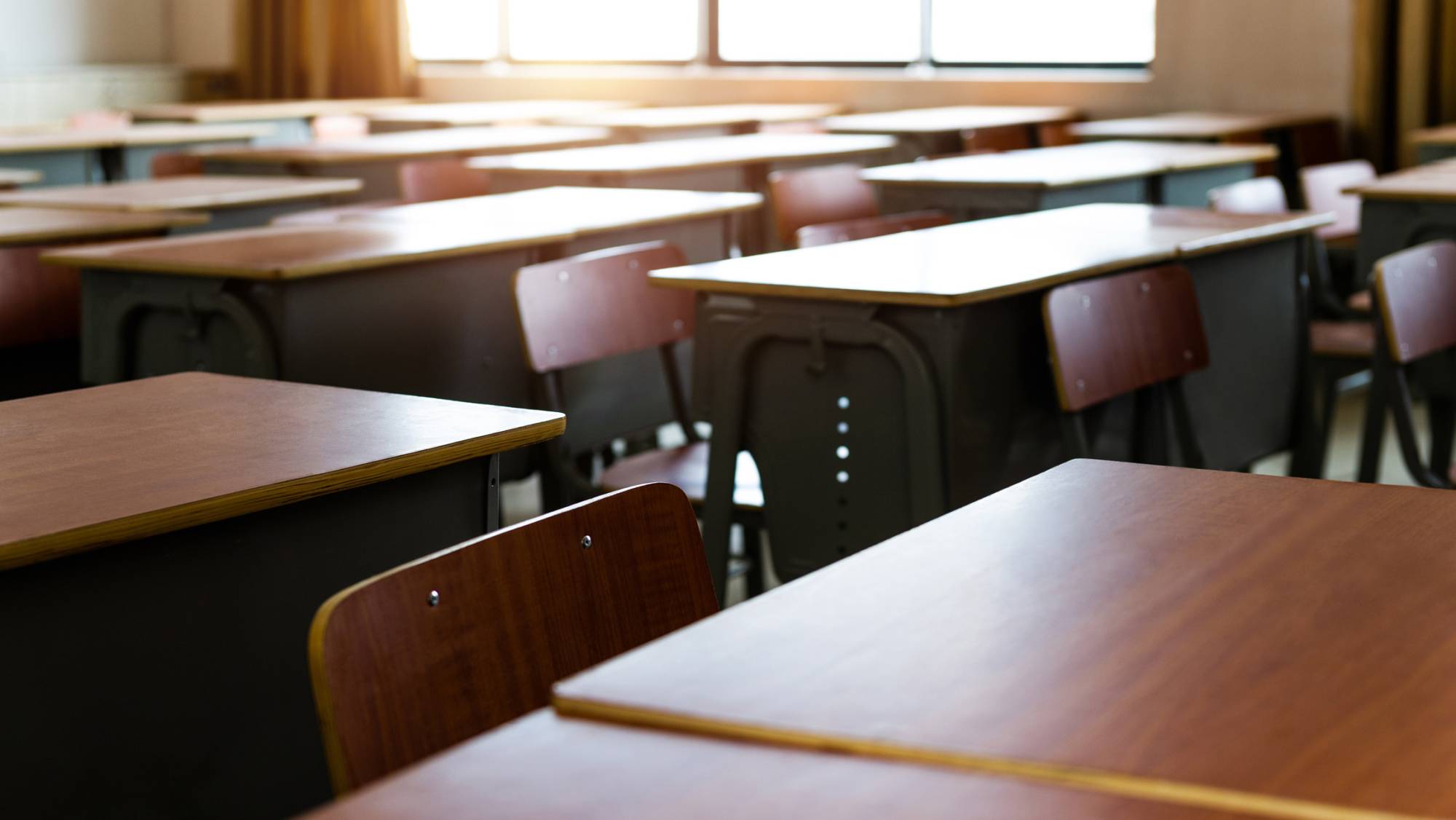 Empty desks in a classroom